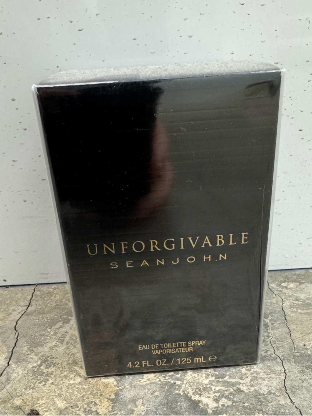 Sean John Unforgivable Men Eau de Toilette Spray - Black with Gold Text